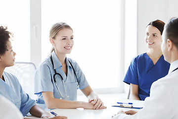 Image showing group of happy doctors meeting at hospital office