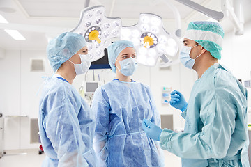 Image showing group of surgeons in operating room at hospital