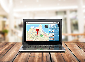 Image showing laptop computer with gps navigator map on screen