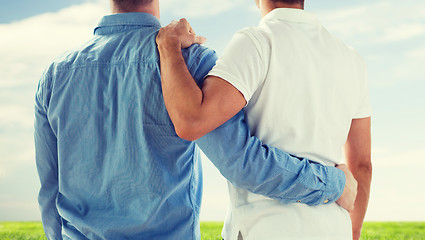 Image showing close up of happy male gay couple hugging