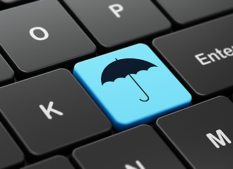 Image showing Privacy concept: Umbrella on computer keyboard background