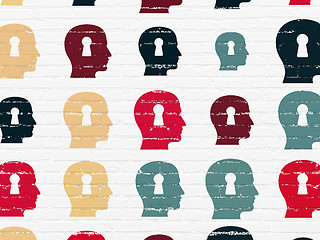 Image showing Marketing concept: Head With Keyhole icons on wall background
