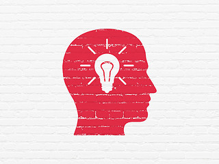 Image showing Information concept: Head With Light Bulb on wall background