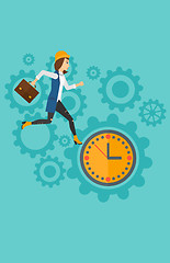 Image showing Running woman on clock background.
