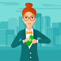 Image showing Woman putting money in pocket.