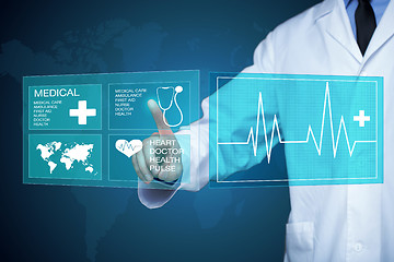 Image showing Doctor working on a virtual screen. medical technology concept. pulse