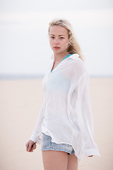 Image showing Beautiful sensual girl alone at beach.