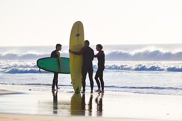 Image showing Surfers surfing on El Cotillo beach, Fuerteventura, Canary Islands, Spain.