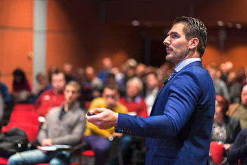 Image showing Public speaker giving talk at Business Event.