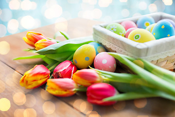 Image showing close up of colored easter eggs and flowers