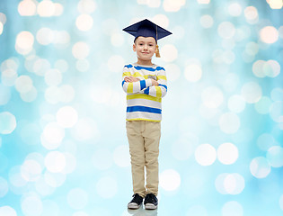 Image showing happy boy in bachelor hat or mortarboard