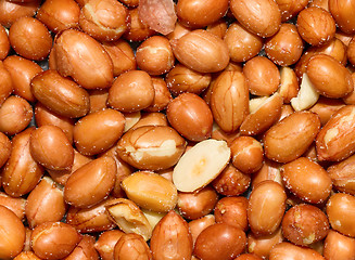 Image showing Stack of unshelled peanuts, salted