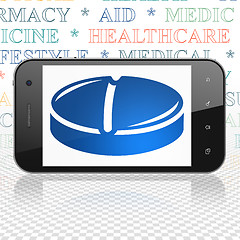 Image showing Healthcare concept: Smartphone with Pill on display