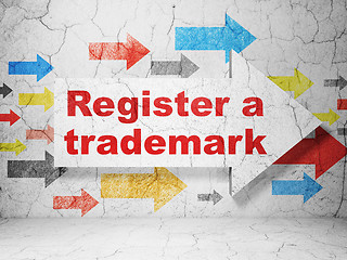 Image showing Law concept: arrow with Register A Trademark on grunge wall background