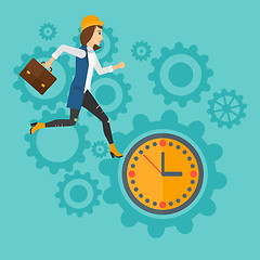Image showing Running woman on clock background.