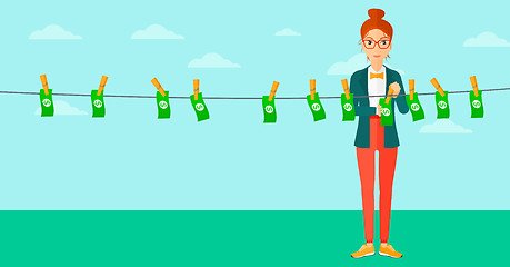 Image showing Woman loundering money.