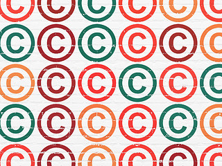 Image showing Law concept: Copyright icons on wall background