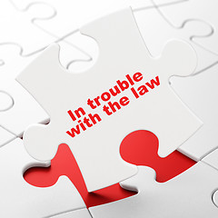 Image showing Law concept: In trouble With The law on puzzle background