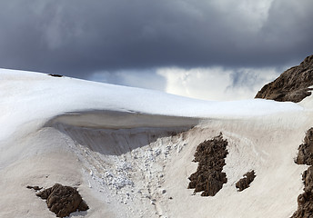 Image showing Snow cornice in mountains. Close-up view.