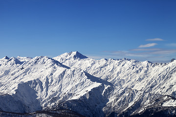 Image showing View on snowy mountains in sunny day