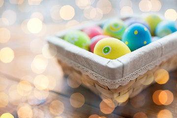 Image showing close up of colored easter eggs in basket