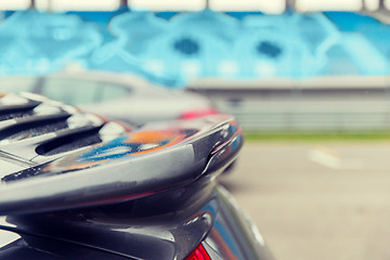 Image showing close up of car spoiler on speedway at stadium