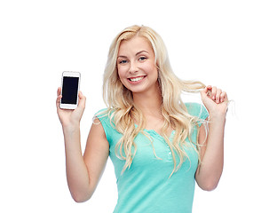 Image showing happy young woman or teenage girl with smartphone