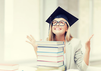 Image showing happy student in graduation cap