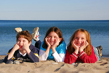 Image showing Three children on a beach