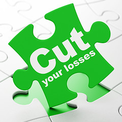 Image showing Finance concept: Cut Your losses on puzzle background