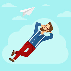 Image showing Businessman relaxing on cloud.