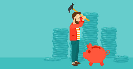 Image showing Man breaking piggy bank.