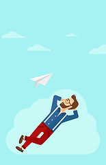 Image showing Businessman relaxing on cloud.