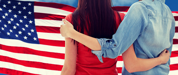 Image showing close up of women couple over american flag