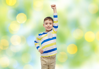 Image showing happy smiling little boy with raised hand