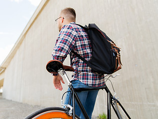 Image showing hipster man with fixed gear bike and backpack