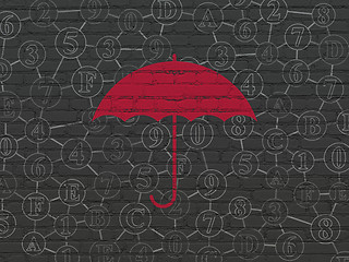 Image showing Safety concept: Umbrella on wall background