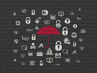 Image showing Security concept: Umbrella on wall background