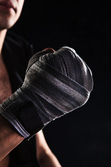 Image showing Close-up hand of muscular man with bandage