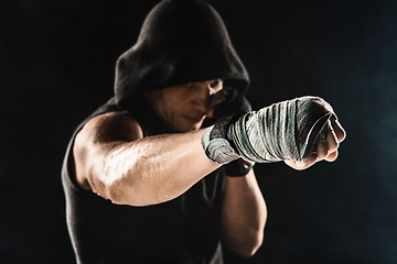 Image showing Close-up hand of muscular man with bandage