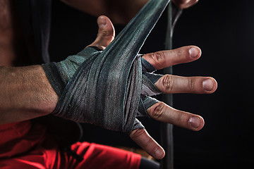 Image showing Close-up hand of muscular man with bandage