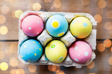 Image showing close up of colored easter eggs in egg box