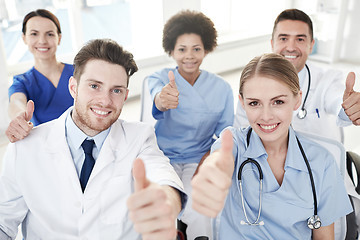 Image showing group of happy doctors on seminar at hospital