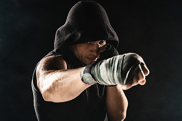 Image showing Close-up hand of muscular man with bandage