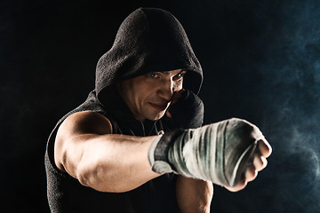 Image showing Close-up hand of muscular man with bandage