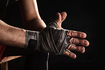 Image showing Close-up hand of muscular man with bandage