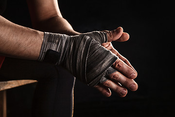 Image showing Close-up hand of muscular man with bandage