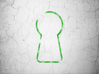 Image showing Privacy concept: Keyhole on wall background