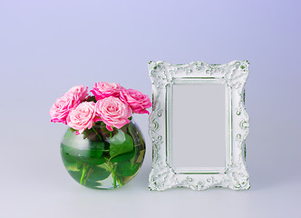 Image showing Flowers vase and vintage frame 