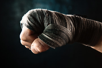 Image showing Close-up hand of muscular man with bandage